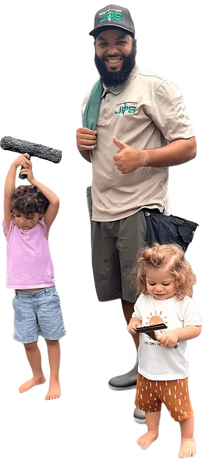 Hasan Johnston in his JPS uniform with two of his children